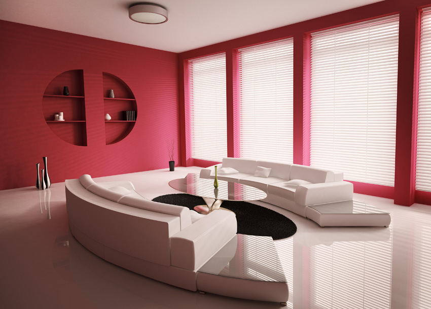 Pavimento lucido del soggiorno e pareti rosse. Un particolare contrasto esaltato dalla resina lucida e opaca